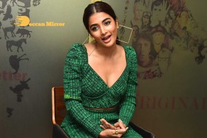 Pooja Hegde in a green dress