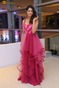 actress pooja kiran lovely looks in a pink dress