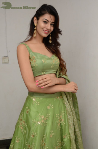 Telugu Actress Pooja Solanki in a green dress