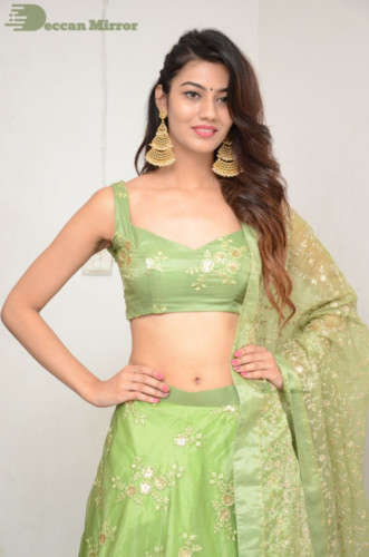 Telugu Actress Pooja Solanki in a green dress