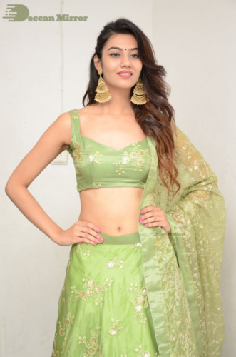Telugu Actress Pooja Solanki in a green dress