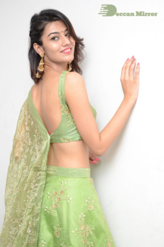 Telugu Actress Pooja Solanki in a green dress