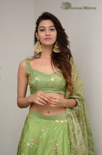 Telugu Actress Pooja Solanki in a green dress