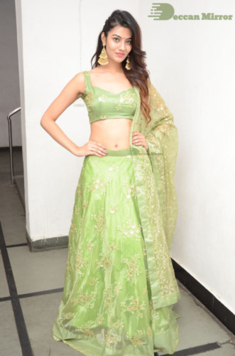 Telugu Actress Pooja Solanki in a green dress