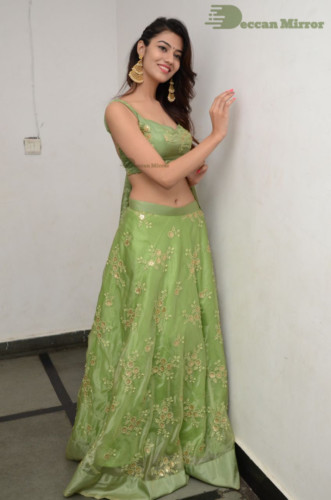 Telugu Actress Pooja Solanki in a green dress