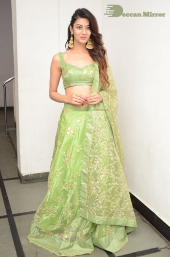 Telugu Actress Pooja Solanki in a green dress
