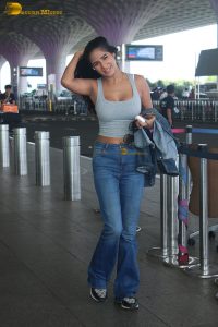 actress Poonam Pandey hot in a tank top and denim jeans