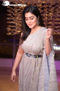 South Actress Poorna in a grey shiny dress