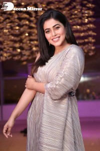 South Actress Poorna in a grey shiny dress