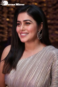 South Actress Poorna in a grey shiny dress