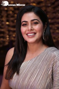 South Actress Poorna in a grey shiny dress
