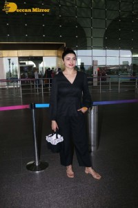 Actress Prachi Desai seen in a black dress at the Mumbai Airport
