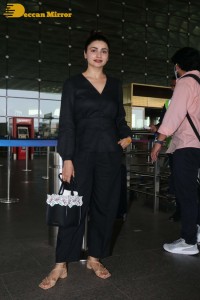 Actress Prachi Desai seen in a black dress at the Mumbai Airport