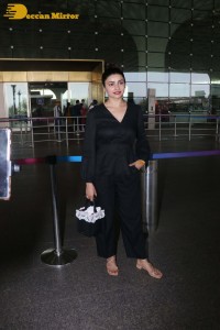 Actress Prachi Desai seen in a black dress at the Mumbai Airport