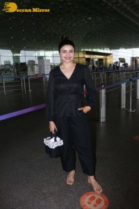 Actress Prachi Desai seen in a black dress at the Mumbai Airport