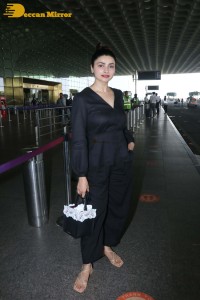 Actress Prachi Desai seen in a black dress at the Mumbai Airport