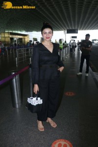 Actress Prachi Desai seen in a black dress at the Mumbai Airport