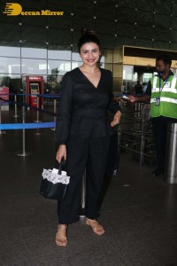 Actress Prachi Desai seen in a black dress at the Mumbai Airport