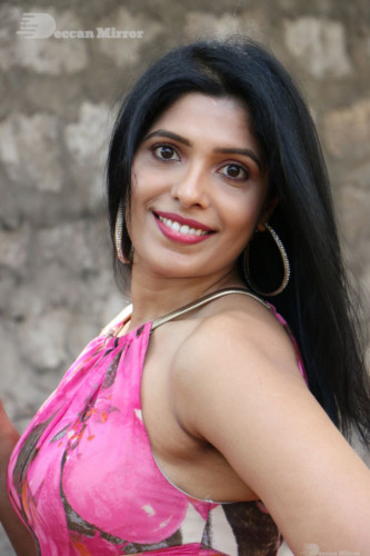 Telugu Actress Pragathi Photoshoot in a pink dress