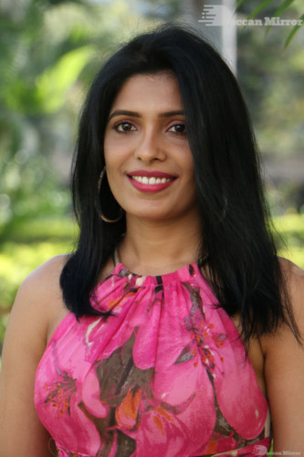 Telugu Actress Pragathi Photoshoot in a pink dress