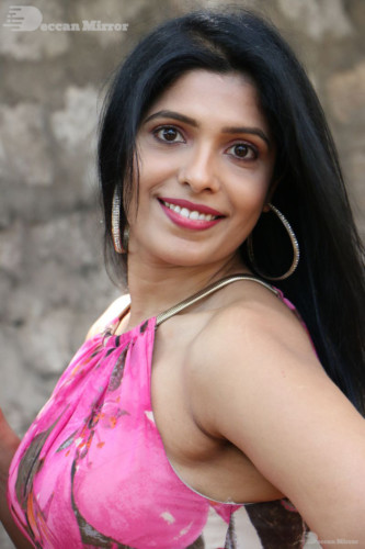 Telugu Actress Pragathi Photoshoot in a pink dress