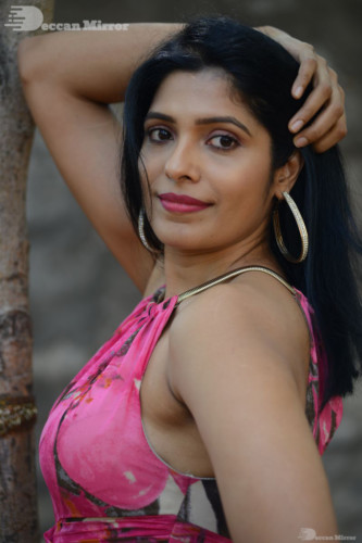 Telugu Actress Pragathi Photoshoot in a pink dress