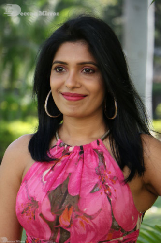 Telugu Actress Pragathi Photoshoot in a pink dress