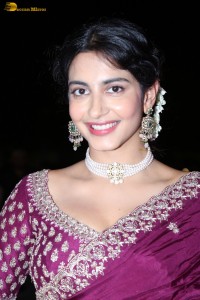 actress Pragati Srivastava dazzles in a maroon saree at a movie event