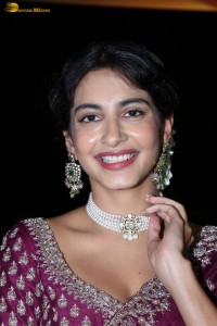 actress Pragati Srivastava dazzles in a maroon saree at a movie event