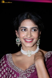 actress Pragati Srivastava dazzles in a maroon saree at a movie event