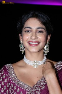 actress Pragati Srivastava dazzles in a maroon saree at a movie event