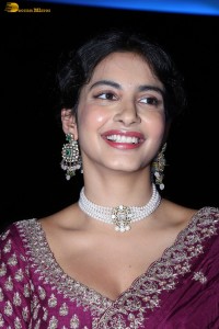 actress Pragati Srivastava dazzles in a maroon saree at a movie event