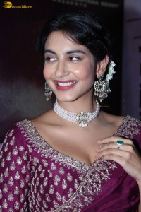 actress Pragati Srivastava dazzles in a maroon saree at a movie event