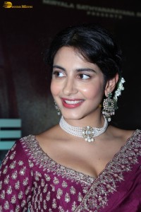 actress Pragati Srivastava dazzles in a maroon saree at a movie event