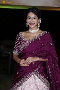 actress Pragati Srivastava dazzles in a maroon saree at a movie event