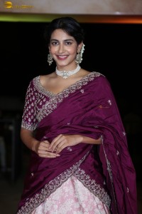 actress Pragati Srivastava dazzles in a maroon saree at a movie event
