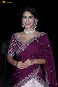 actress Pragati Srivastava dazzles in a maroon saree at a movie event