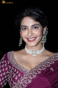 actress Pragati Srivastava dazzles in a maroon saree at a movie event