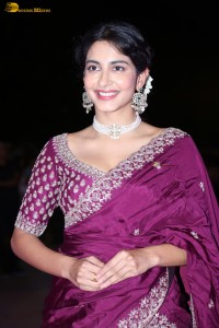 actress Pragati Srivastava dazzles in a maroon saree at a movie event