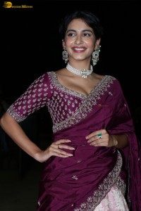 actress Pragati Srivastava dazzles in a maroon saree at a movie event