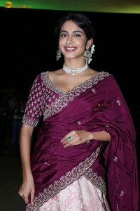 actress Pragati Srivastava dazzles in a maroon saree at a movie event
