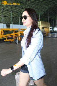 Pragya Jaiswal in a shirt and denim shorts at Mumbai Airport