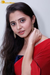 Telugu Actress Preethi Asrani in a red saree