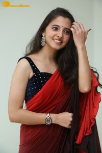 Telugu Actress Preethi Asrani in a red saree