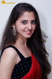 Telugu Actress Preethi Asrani in a red saree