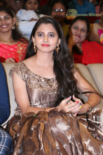 Telugu Actress Preethi Asrani in a gold colored dress attending a movie function