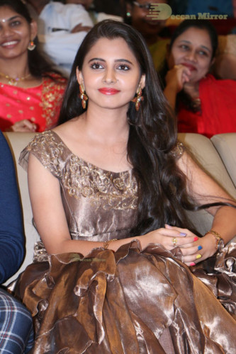 Telugu Actress Preethi Asrani in a gold colored dress attending a movie function