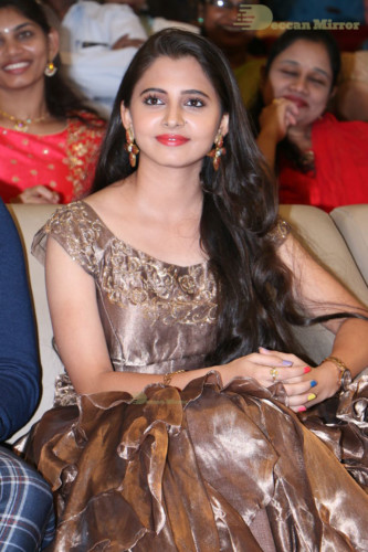 Telugu Actress Preethi Asrani in a gold colored dress attending a movie function