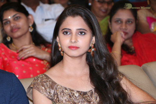 Telugu Actress Preethi Asrani in a gold colored dress attending a movie function