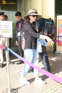 actress Preity Zinta in black shirt and blue denim jeans